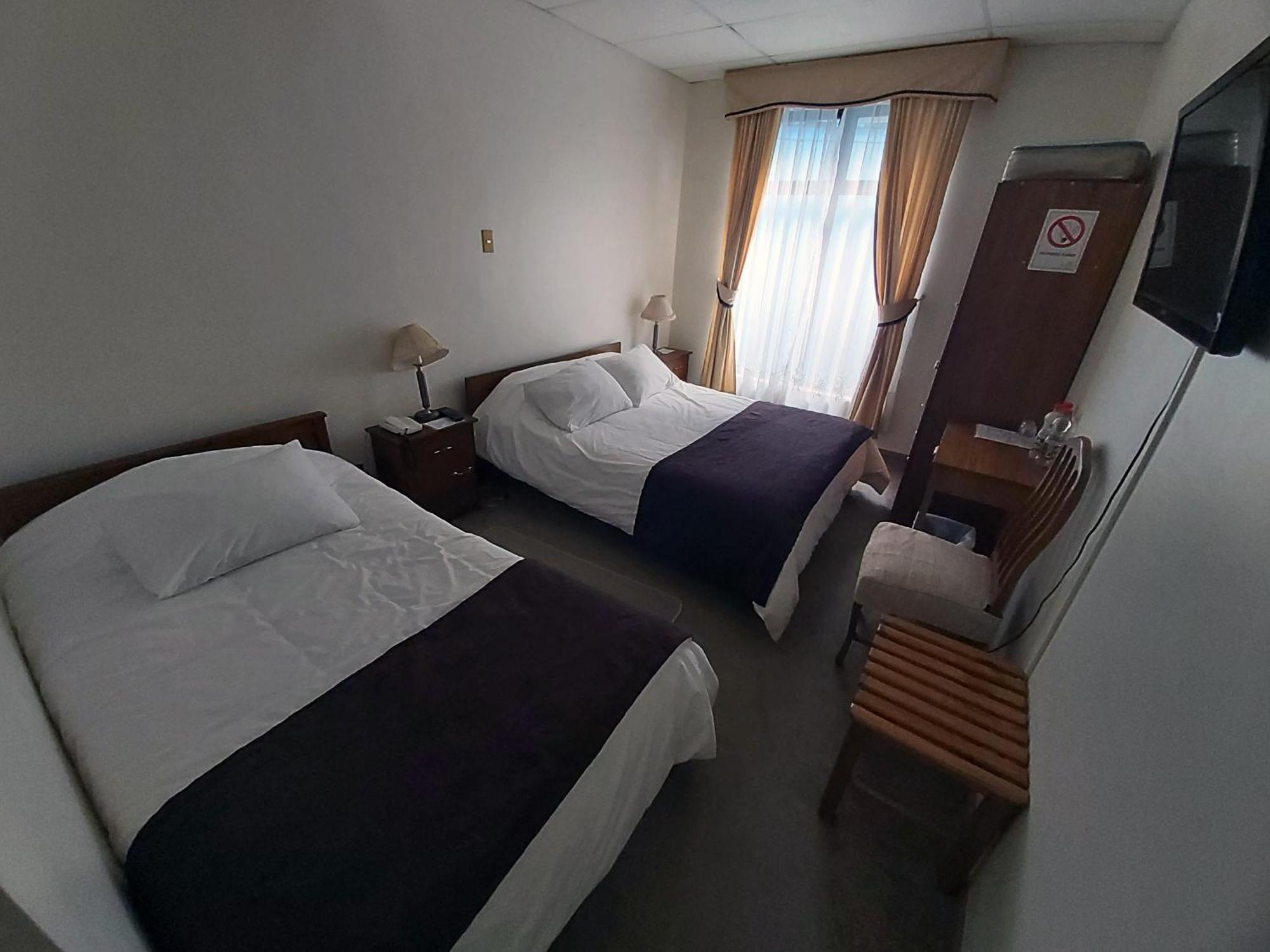 Hotel Esmeralda Castro Quarto foto